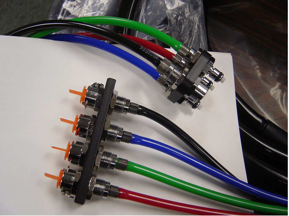 Nuclear Industry – Pneumatic Robot Umbilical Assemblies Pneumatic manifold assembly with color-coded tubing and fittings